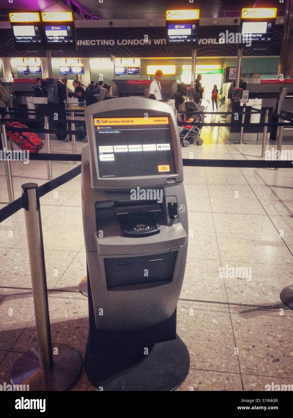 A baggage checkin machine at Heathrow airport Stock Photo Alamy