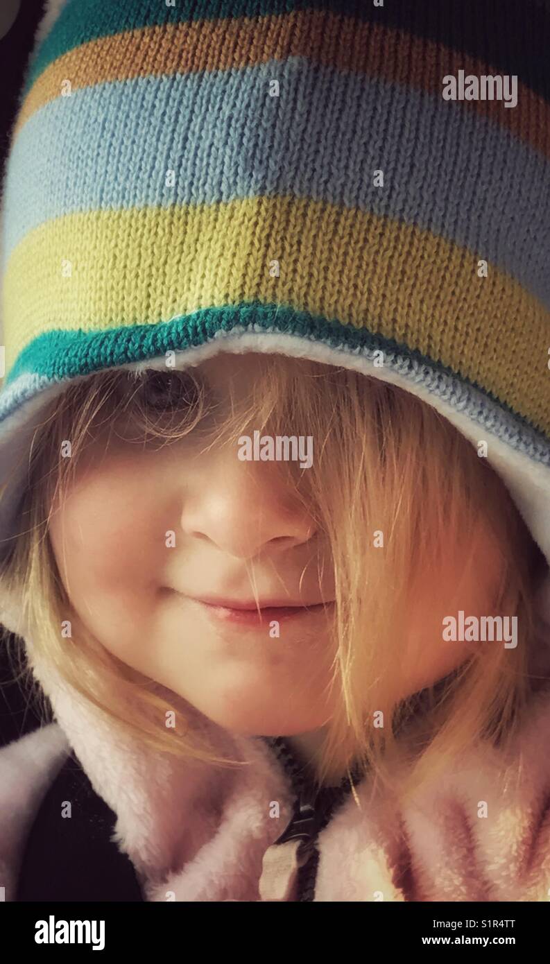 Young girl wearing winter hat Stock Photo
