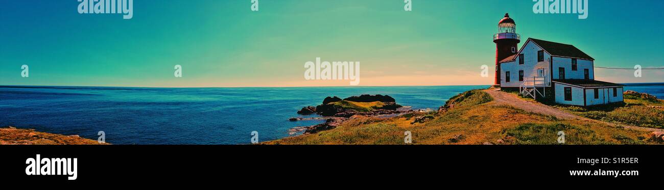 Panorama of the Atlantic Ocean with Ferryland Head Lighthouse (1871), Avalon Peninsula, Newfoundland, Canada - Smartphone Captured Stock Image