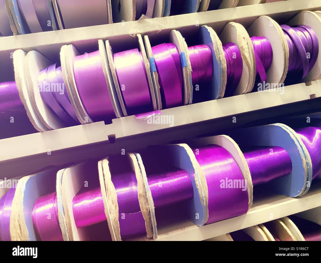 Purple, lavender, Violet Hughes of satin rolls of ribbons, garment