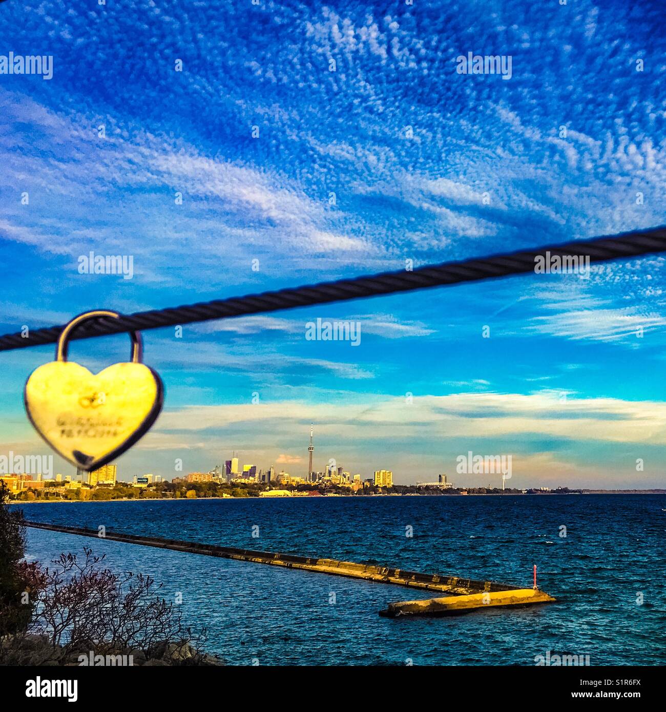 I ️ Toronto. Canada. View from Humber Bay Arch Bridge with heart shaped love lock Stock Photo