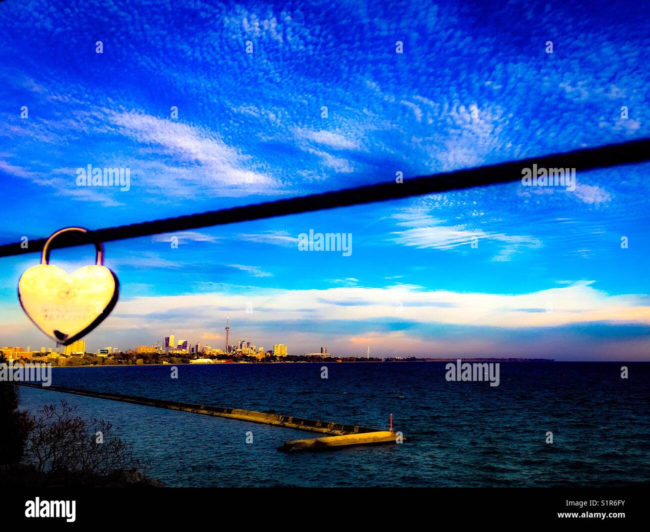 I ️ Toronto. Canada. View from Humber Bay Arch Bridge with heart shaped love lock Stock Photo