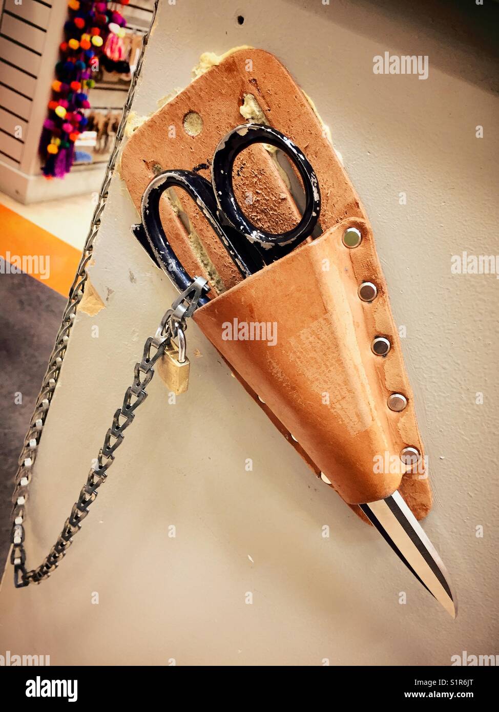 Scissors in leather holster, retail trim shop, garment district, USA Stock  Photo - Alamy