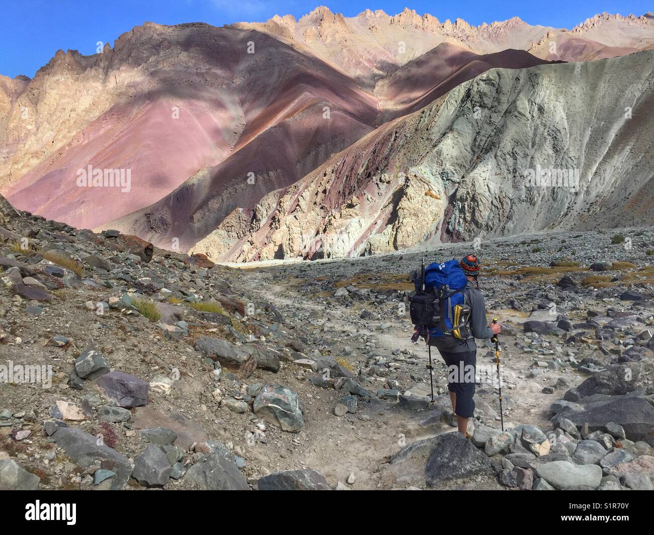 Man with backpack in Ladakh mountains, Kashmir, India - Smartphone Captured Stock Image