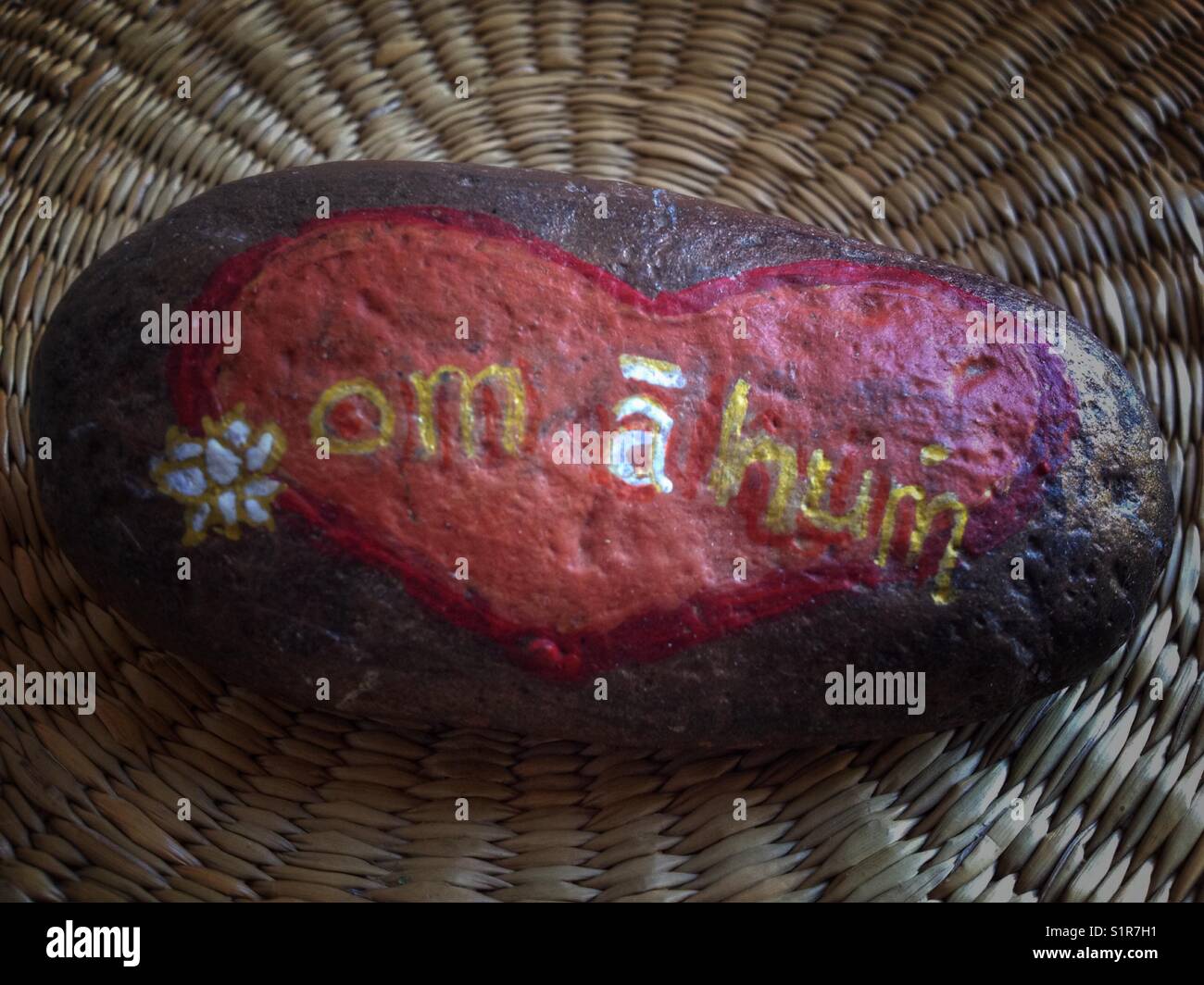 On a hum painted rock - Smartphone Captured Stock Image