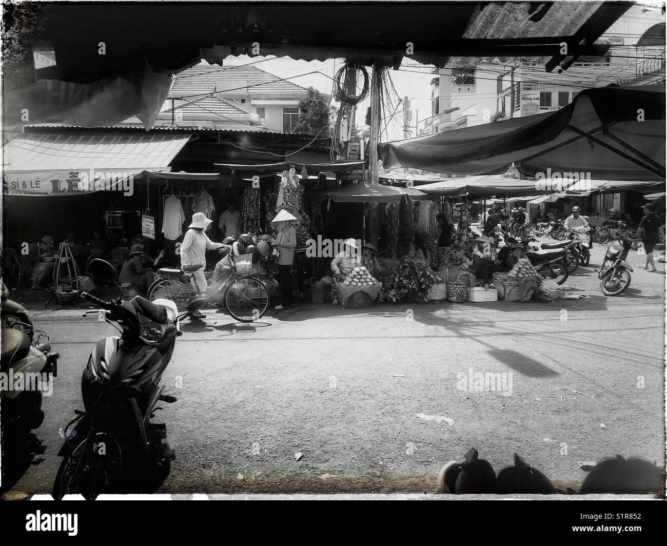 The streets of cho xom moi market early morning. - Smartphone Captured Stock Image