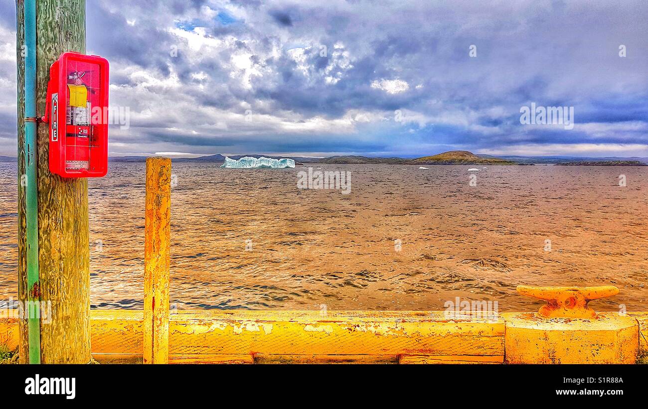 Iceberg and fire extinguisher, Newfoundland, Canada - Smartphone Captured Stock Image