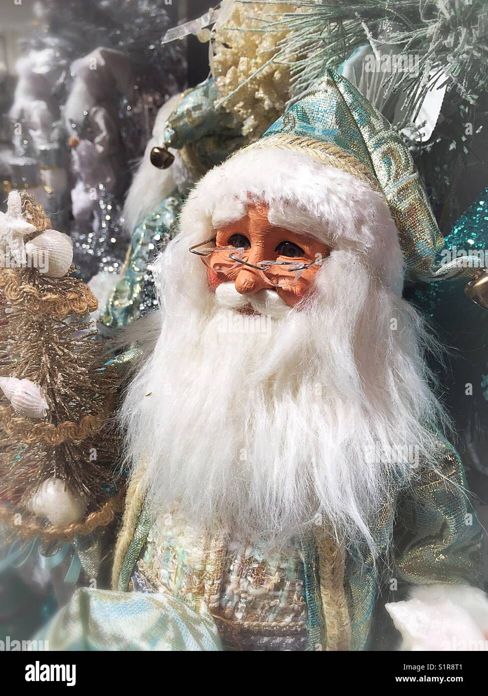 Gold suited Santa Claus figurine, USA Stock Photo - Alamy