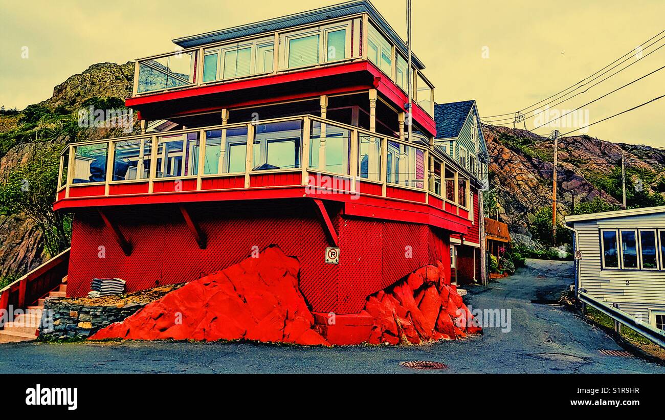 Red corner house in The Battery neighbourhood, Signal Hill, St John’s, Newfoundland, Canada