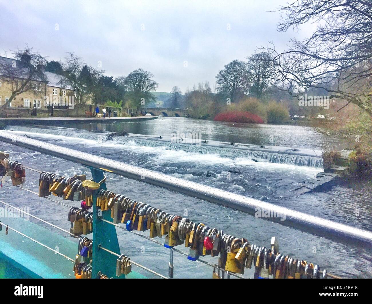 Weir Bridge with lovelocks over the River Wye, Bakewell, Derbyshire