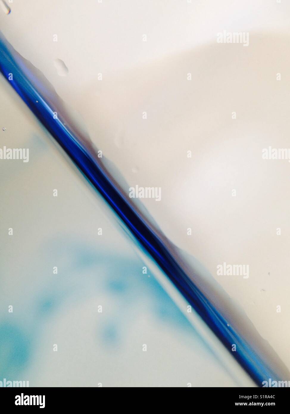 Blue dye in water - Smartphone Captured Stock Image