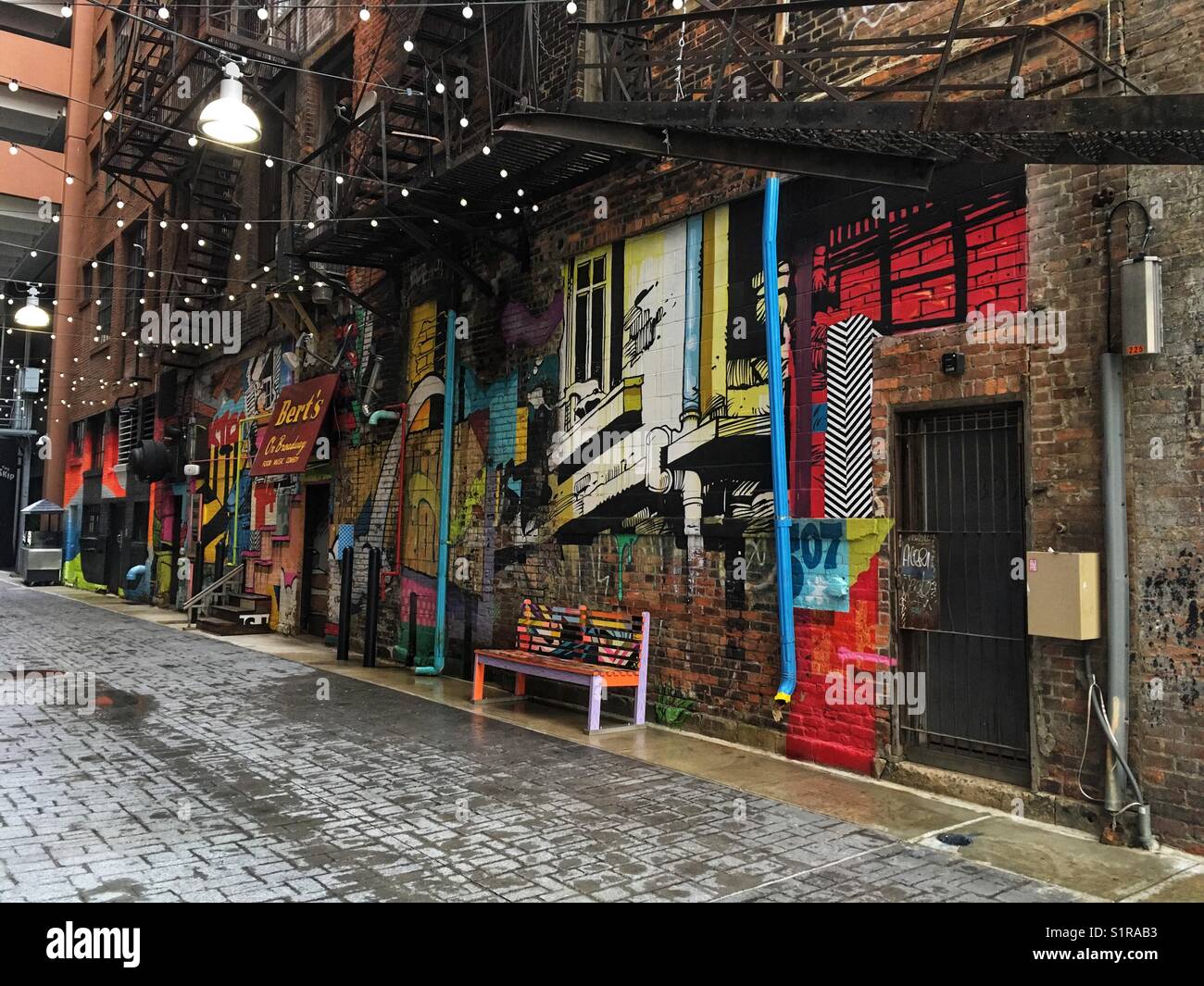 Detroit, Michigan alley with graffiti art wall Stock Photo