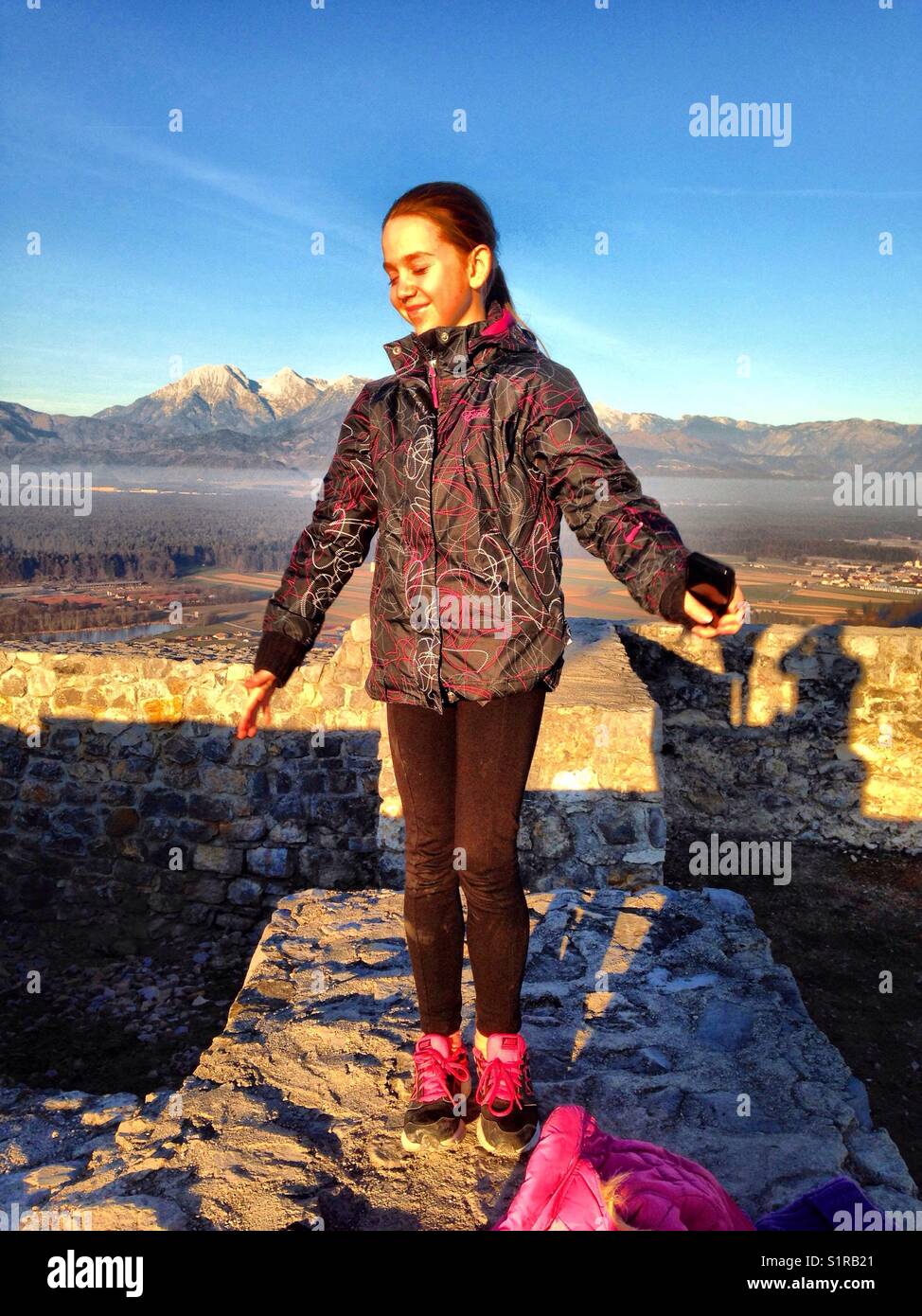 Girl on hill top hi-res stock photography and images - Alamy