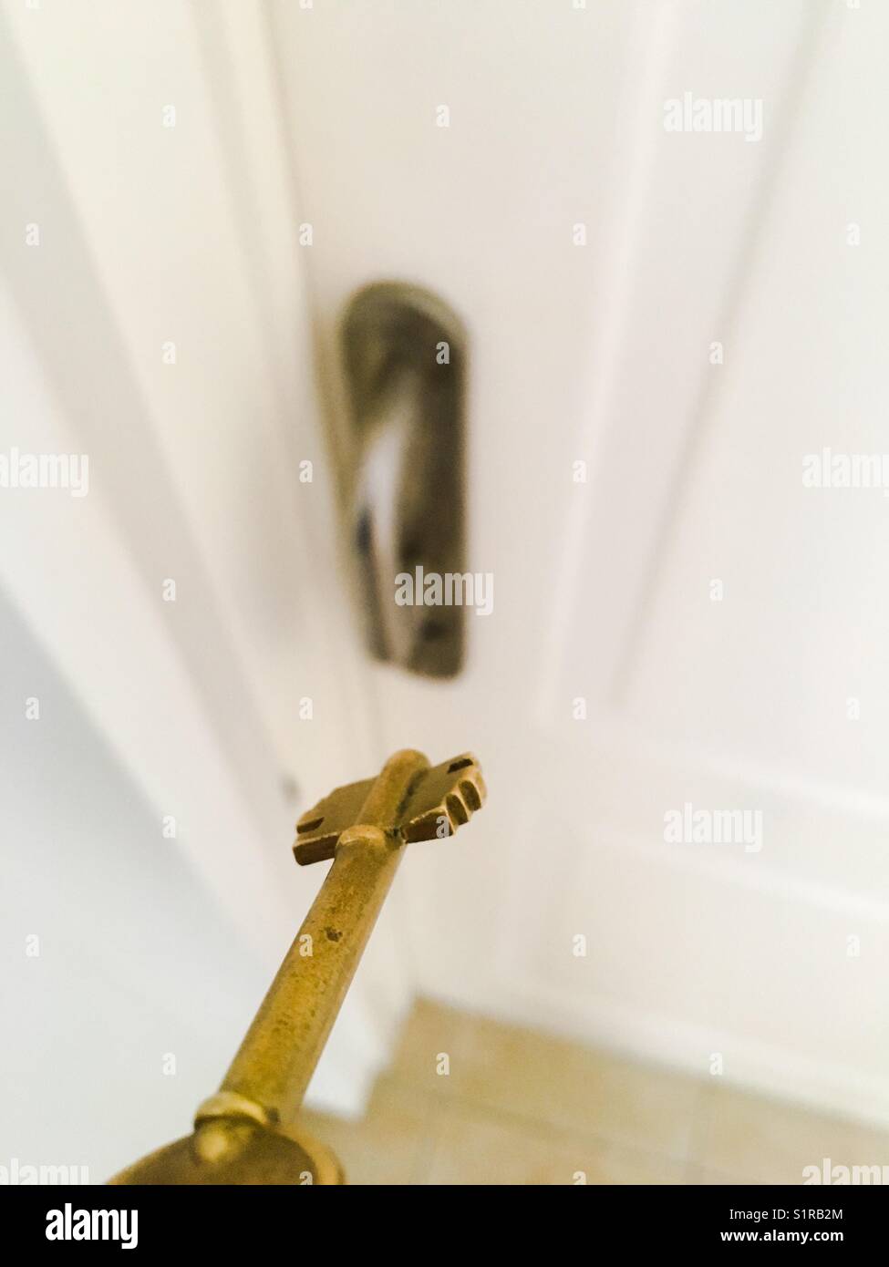 Key and door closeup - Smartphone Captured Stock Image