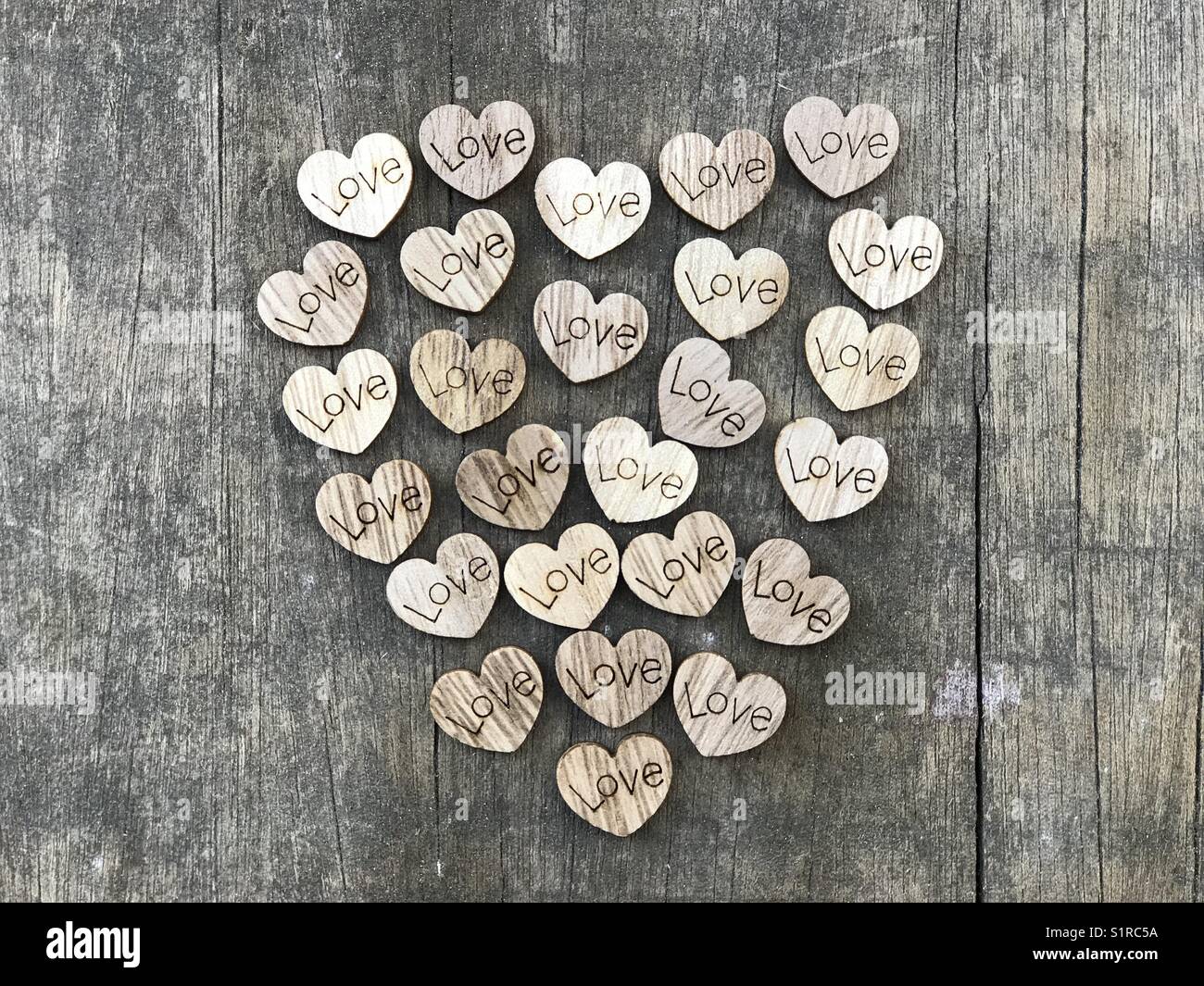 Cloud of love wooden hearts Stock Photo