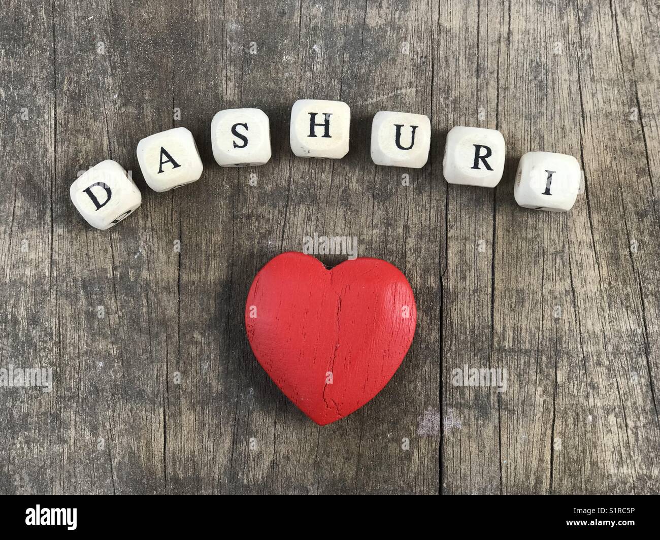 Dashuri, love in albanian language with wooden letters Stock Photo
