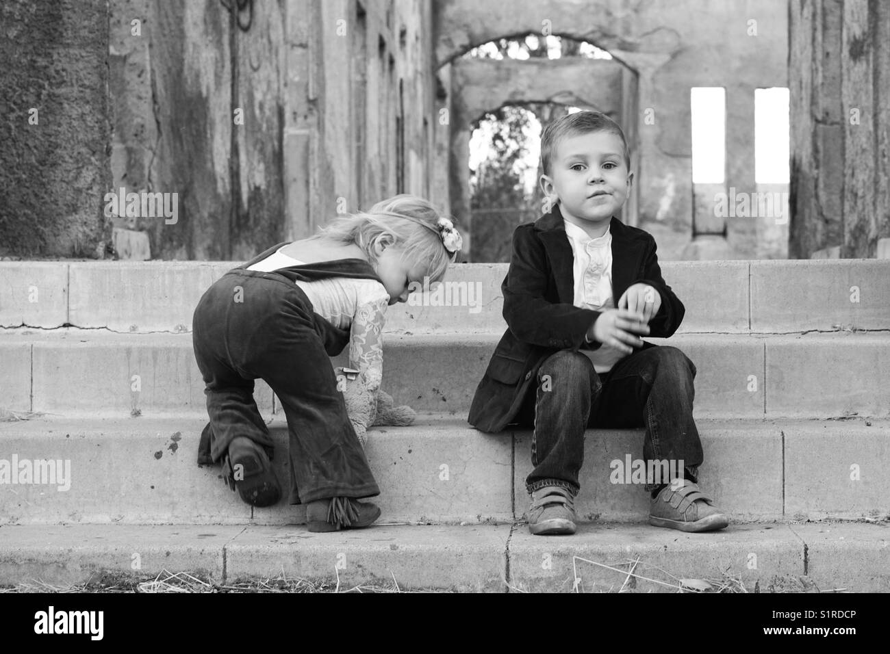 Little boy on stairs hi-res stock photography and images - Alamy