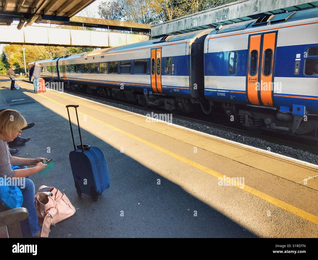 Passengers waiting for a train - Smartphone Captured Stock Image