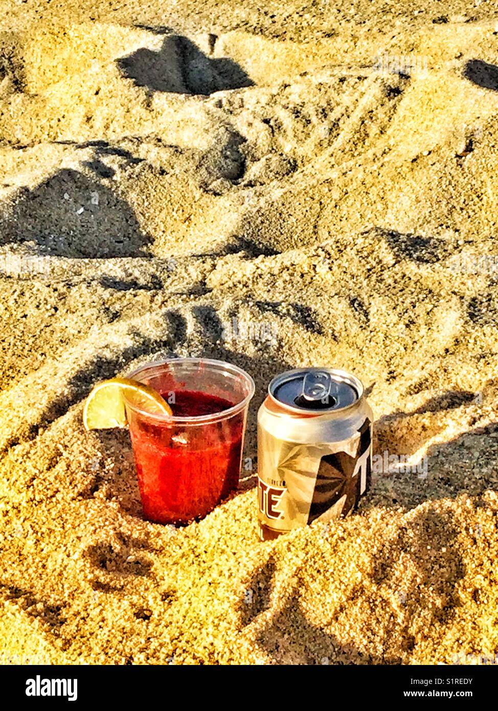 Drinks in the sand. - Smartphone Captured Stock Image