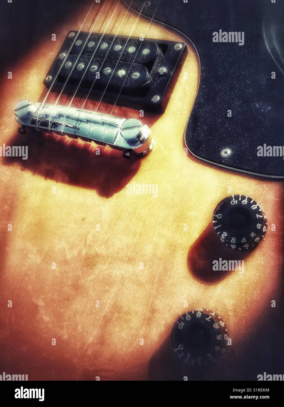Old orange electric guitar - Smartphone Captured Stock Image