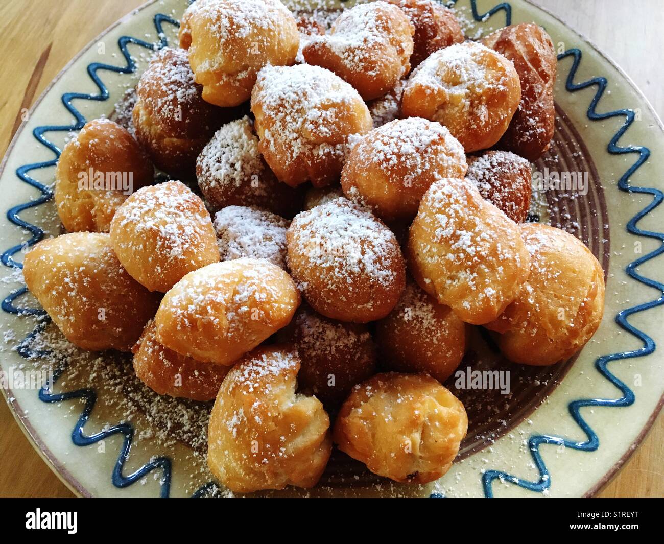 German fried yeast dough pieces called schmalzkuchen - Smartphone Captured Stock Image