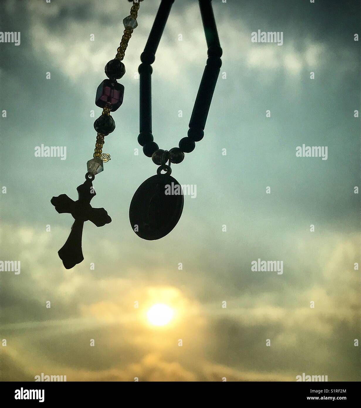 A rosary at sunset in Mexico City - Smartphone Captured Stock Image