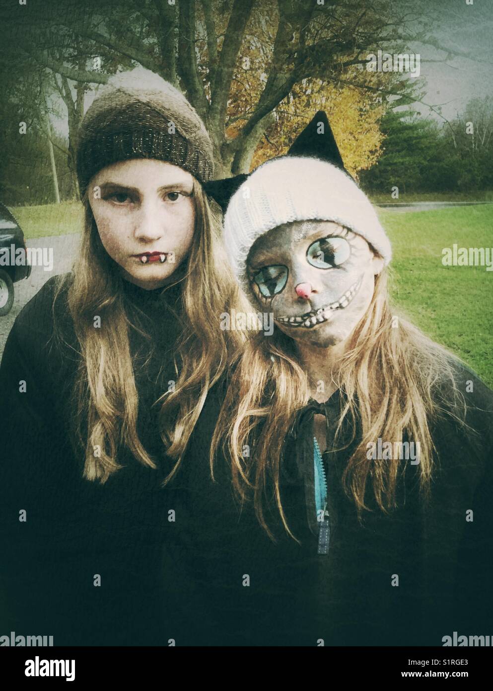 Two girls in Halloween costume with makeup - Smartphone Captured Stock Image