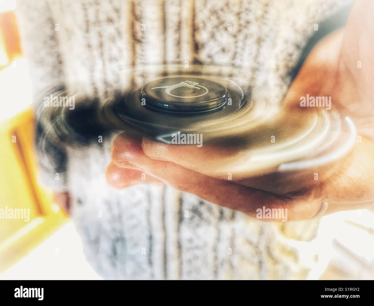 Fidget spinner, high angle view Stock Photo