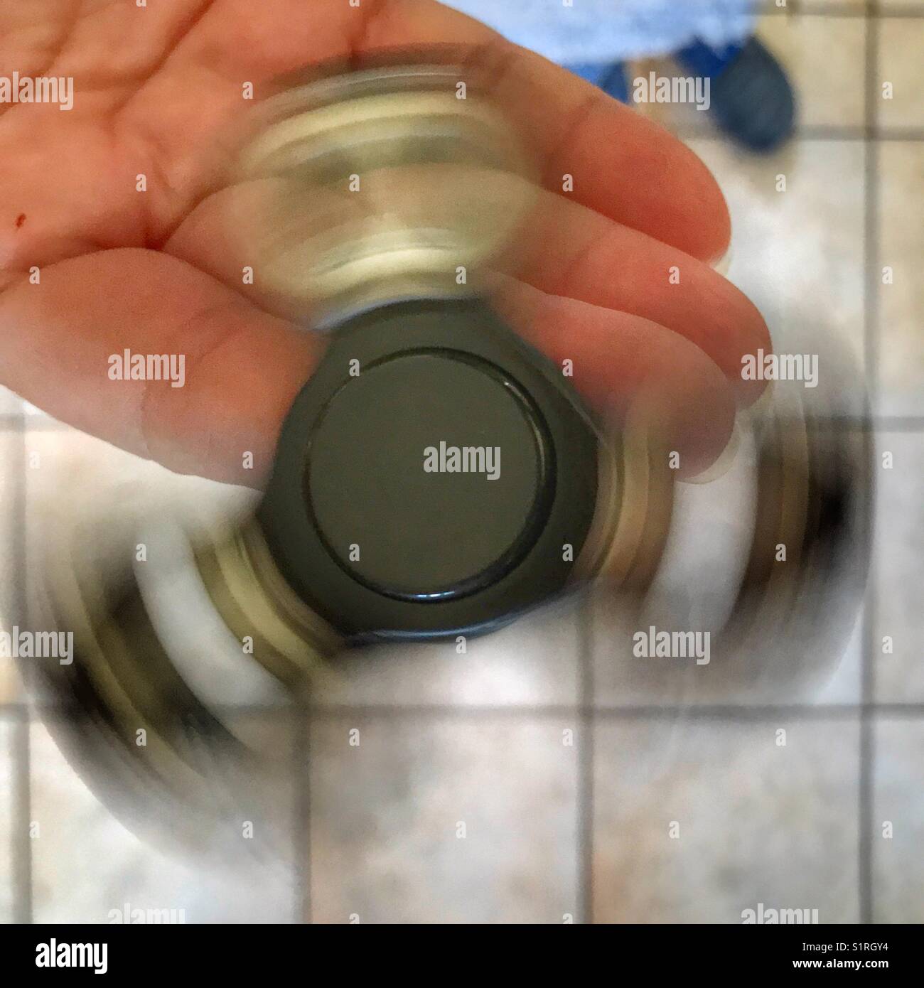 Fidget spinner, high angle view - Smartphone Captured Stock Image