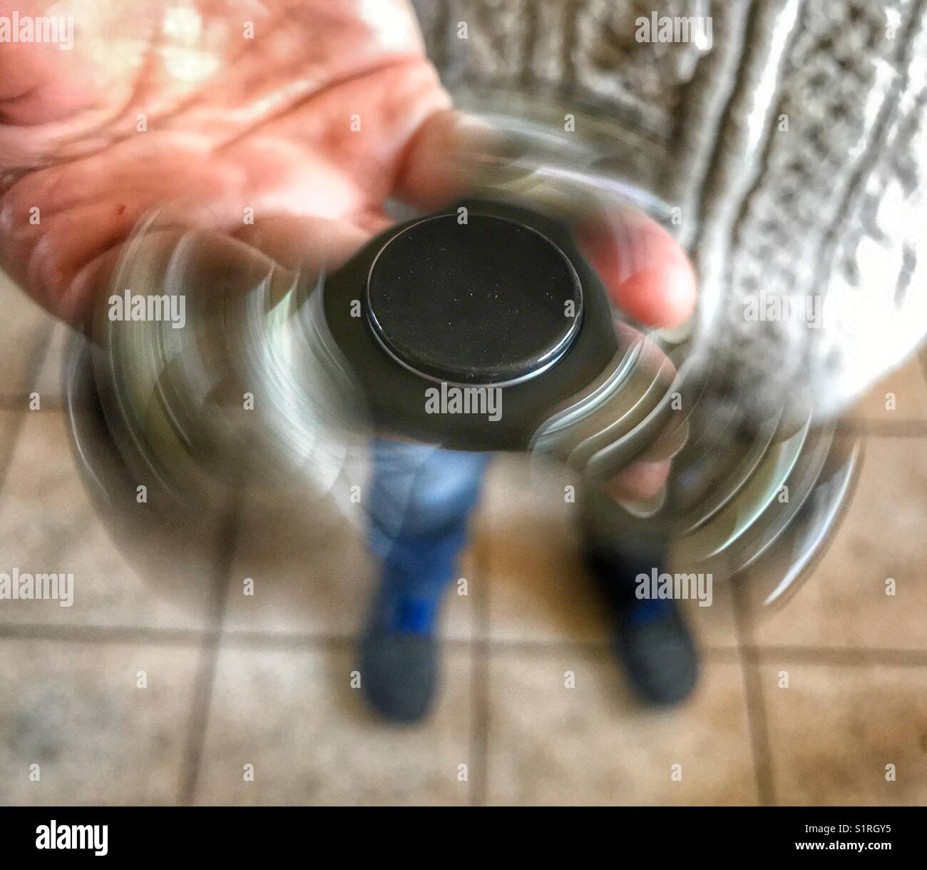 Fidget spinner, high angle view - Smartphone Captured Stock Image