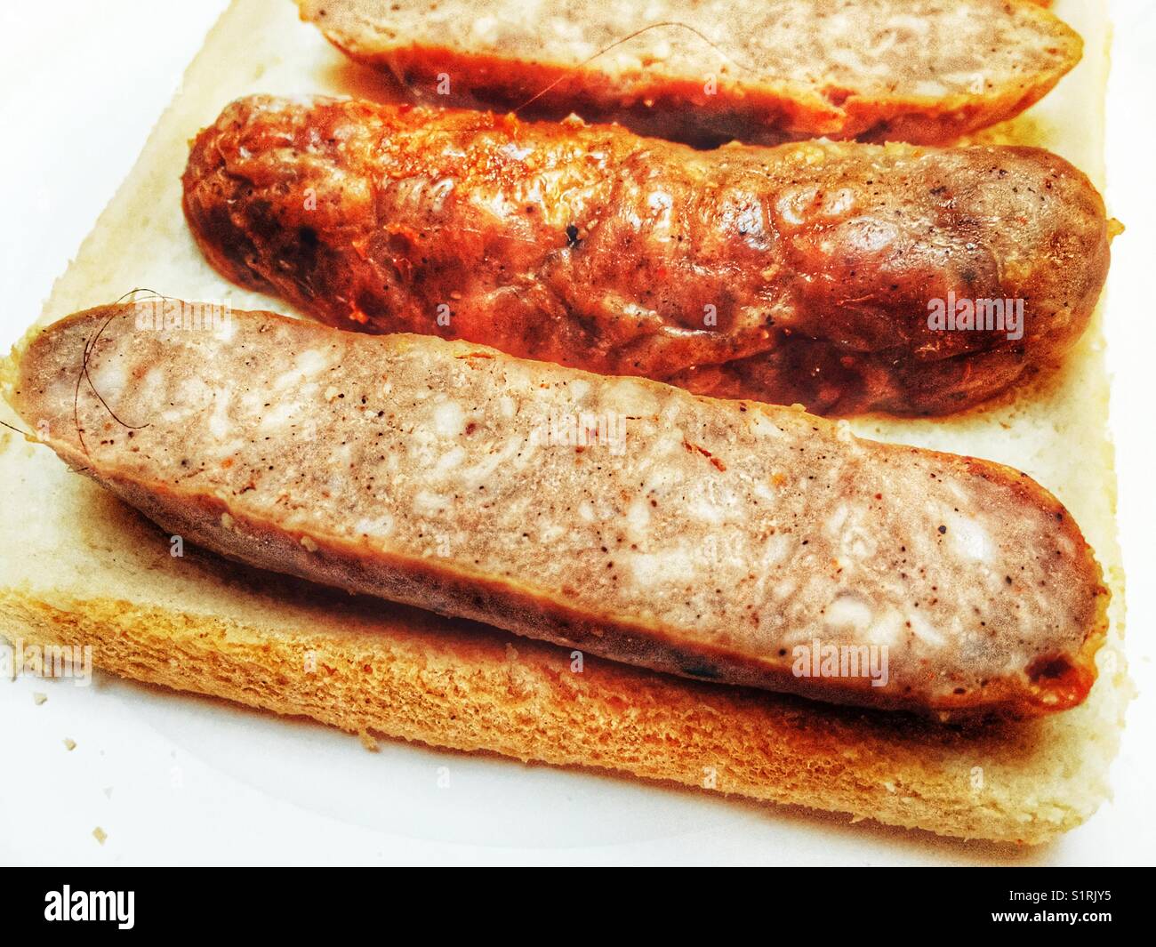 Cold sausage sandwich Stock Photo Alamy