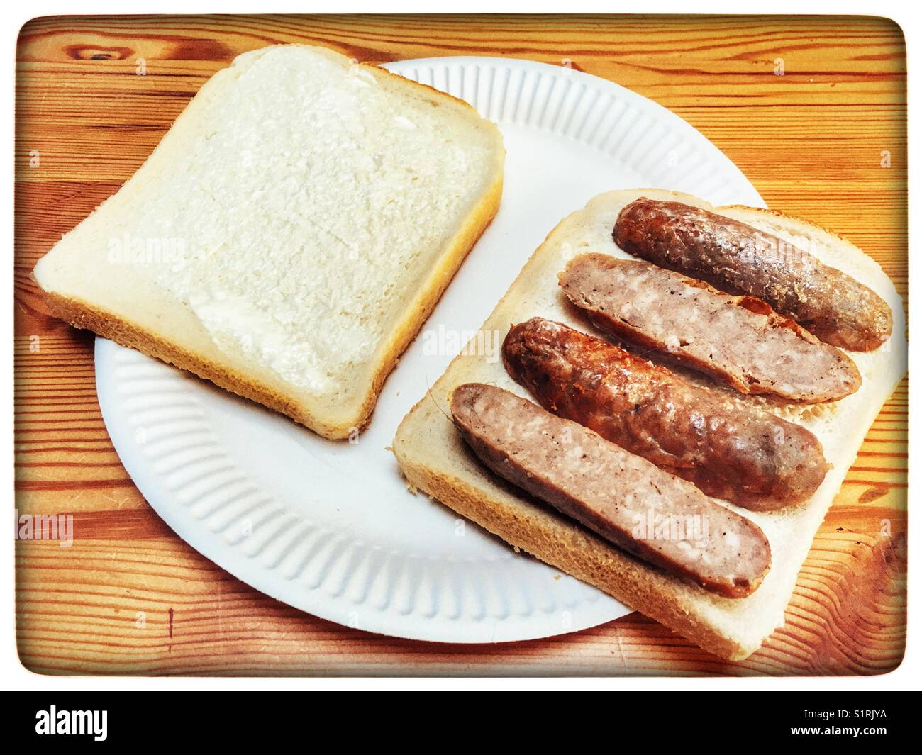 Cold sausage sandwich Stock Photo Alamy