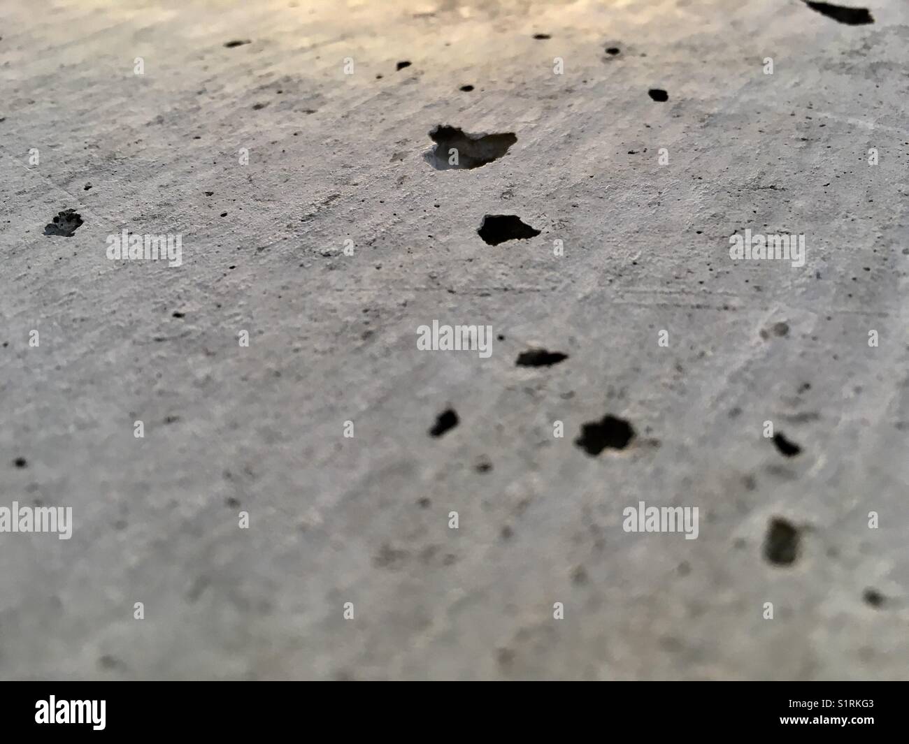 Photo d’un mur de béton. Close-up of a concrete wall. Stock Photo