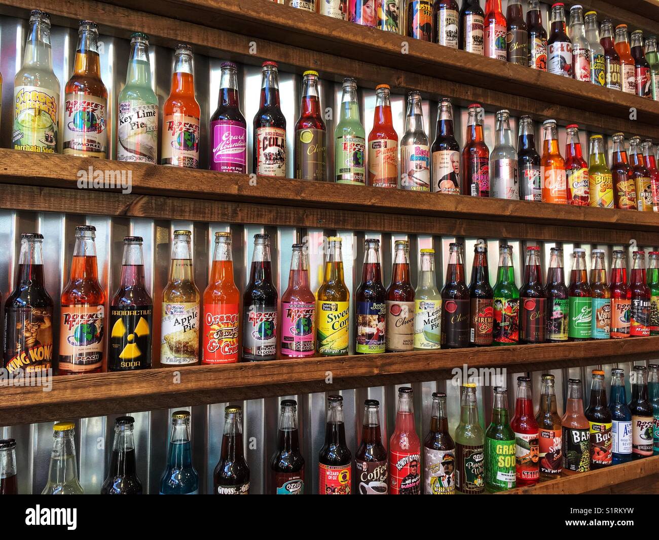 Rows of a soda bottles with many different flavors - Smartphone Captured Stock Image