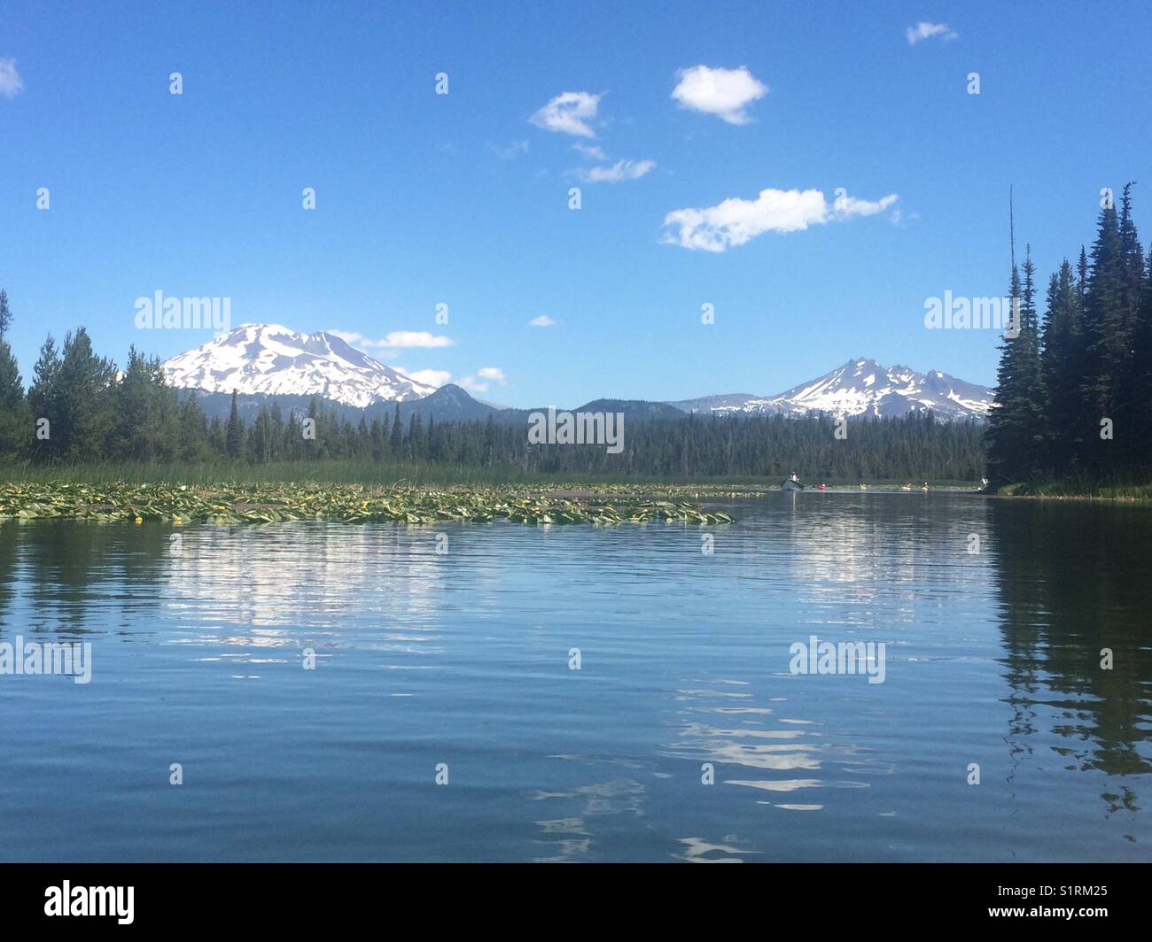 Beautiful Cascade Mountain Range view from Sparks Lake in Bend, Oregon Stock Photo