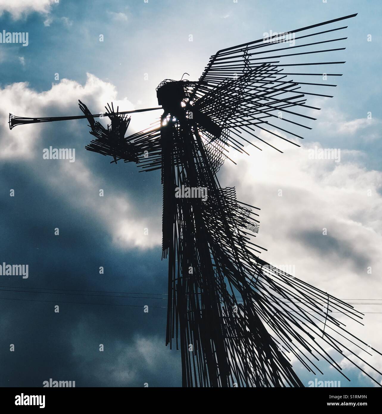 Chernobyl Disaster Memorial sculpture, the iron angel, on a cloudy day - Smartphone Captured Stock Image