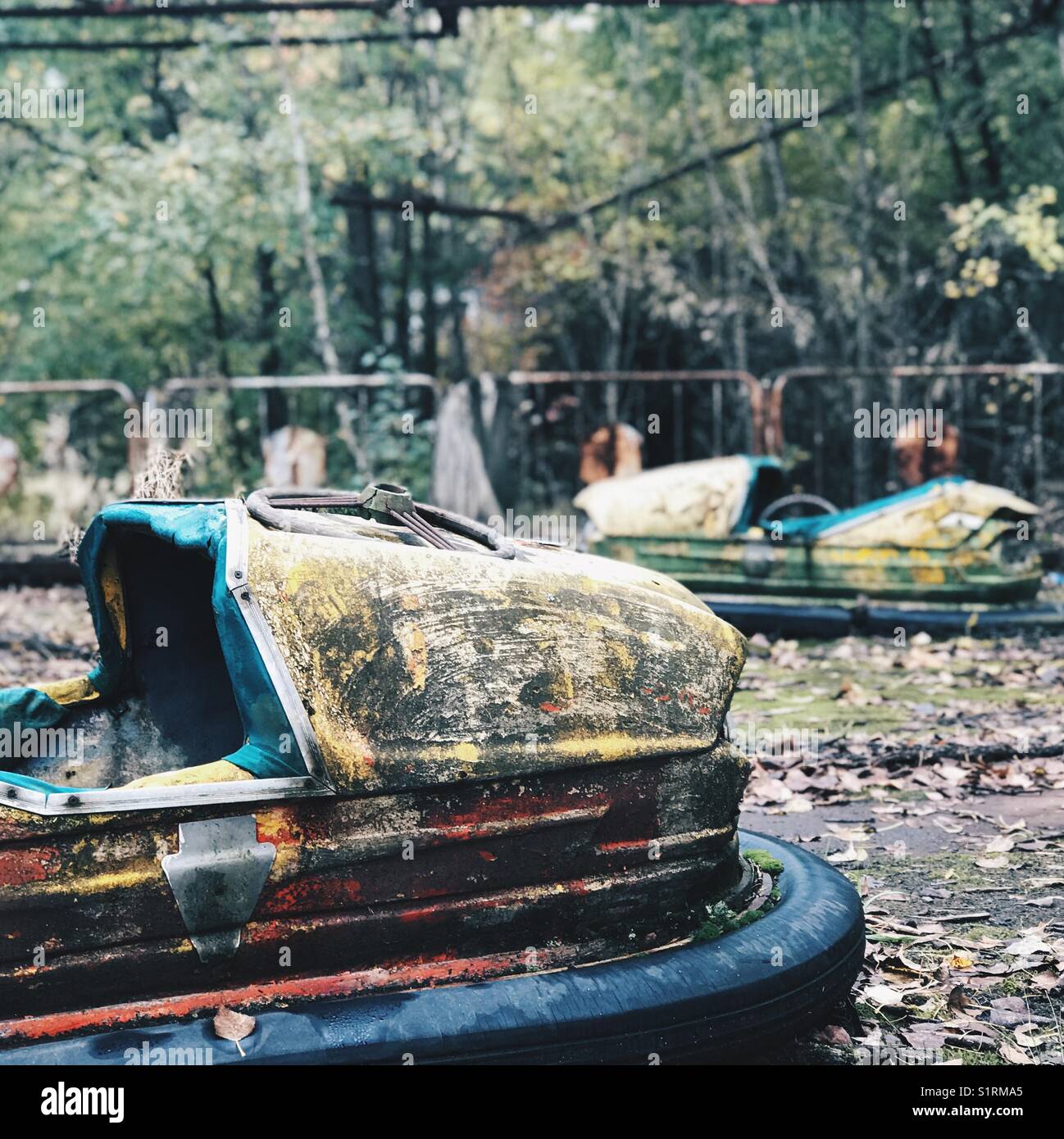 Abandoned bumper cars at the amusement center in Pripyat City, Ukraine - Smartphone Captured Stock Image