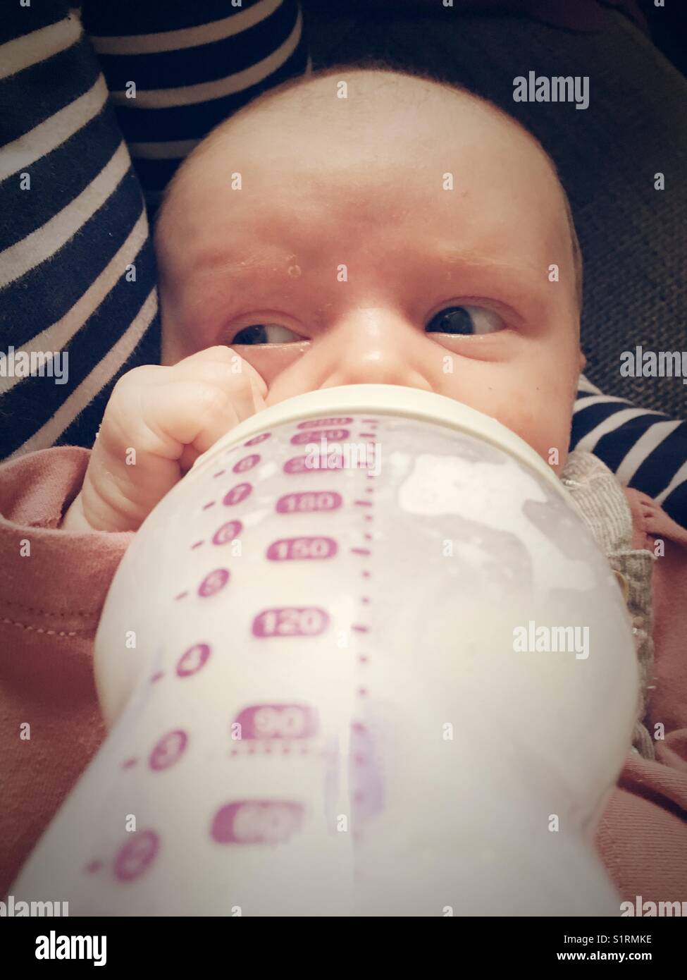 Baby bottle feeding Stock Photo