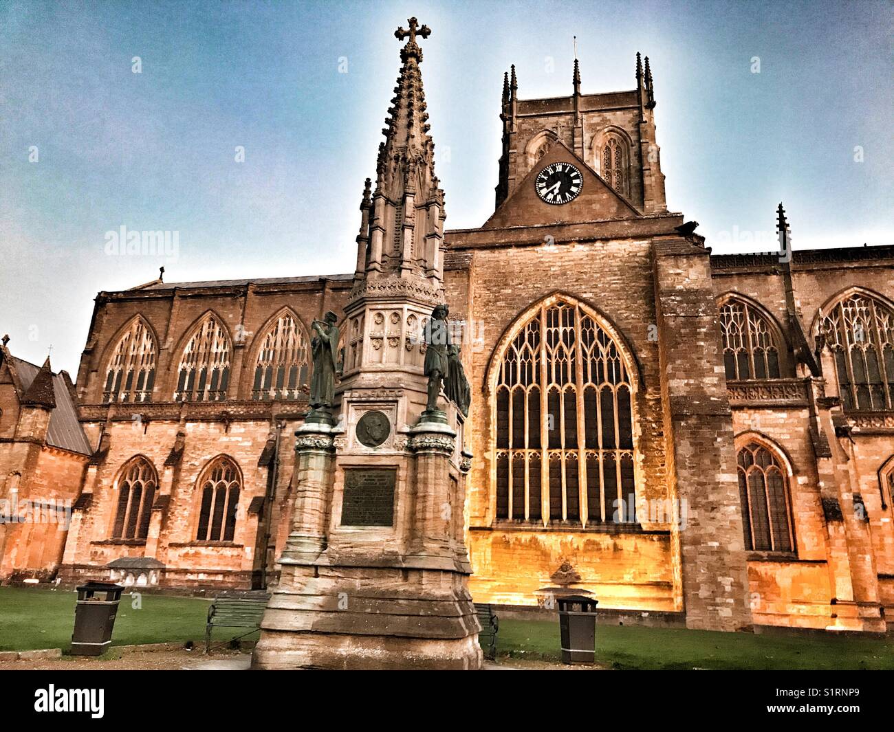 Digby Memorial and Sherborne Abbey, historic building, floodlit at dawn