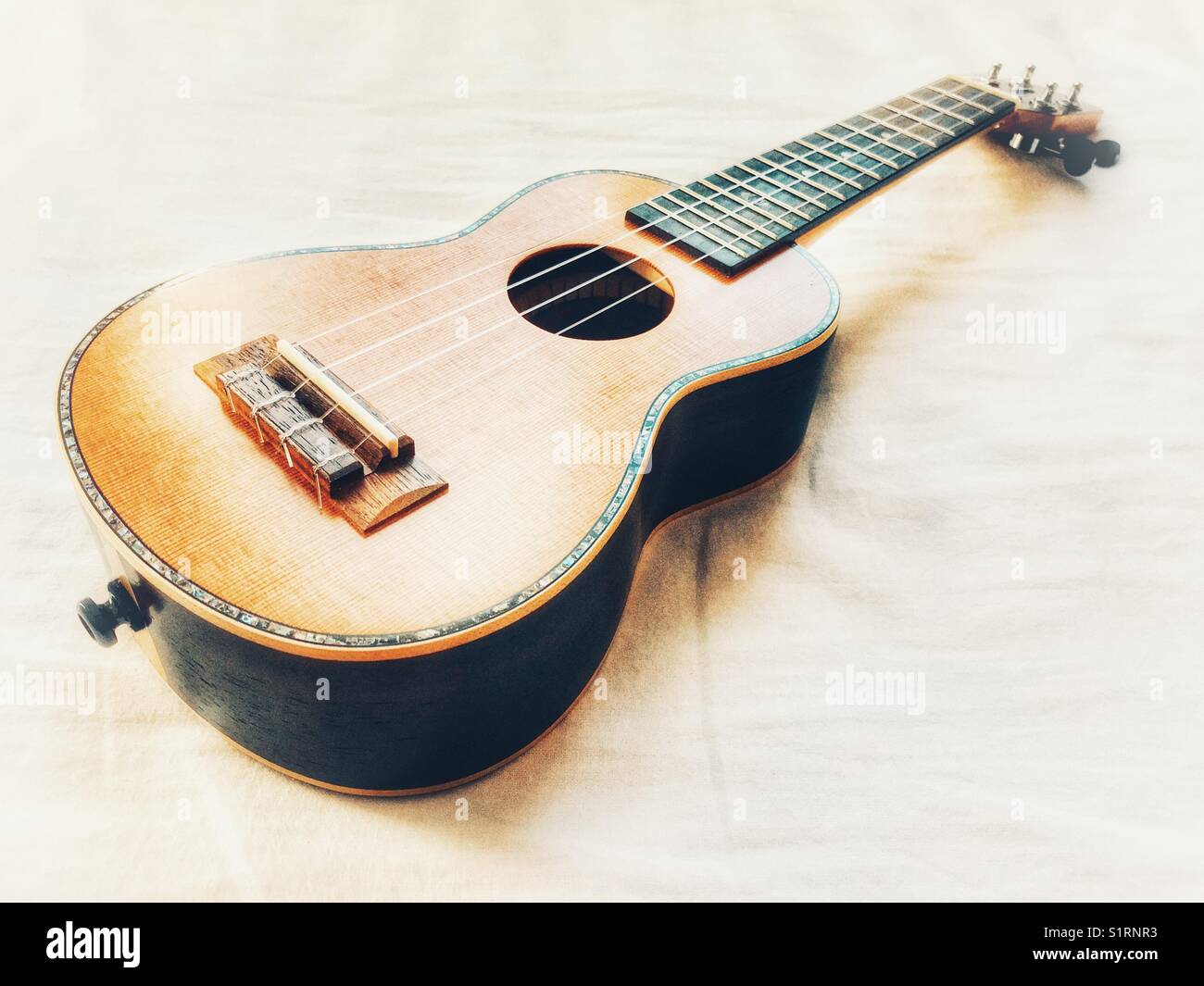 Soprano ukulele - Smartphone Captured Stock Image