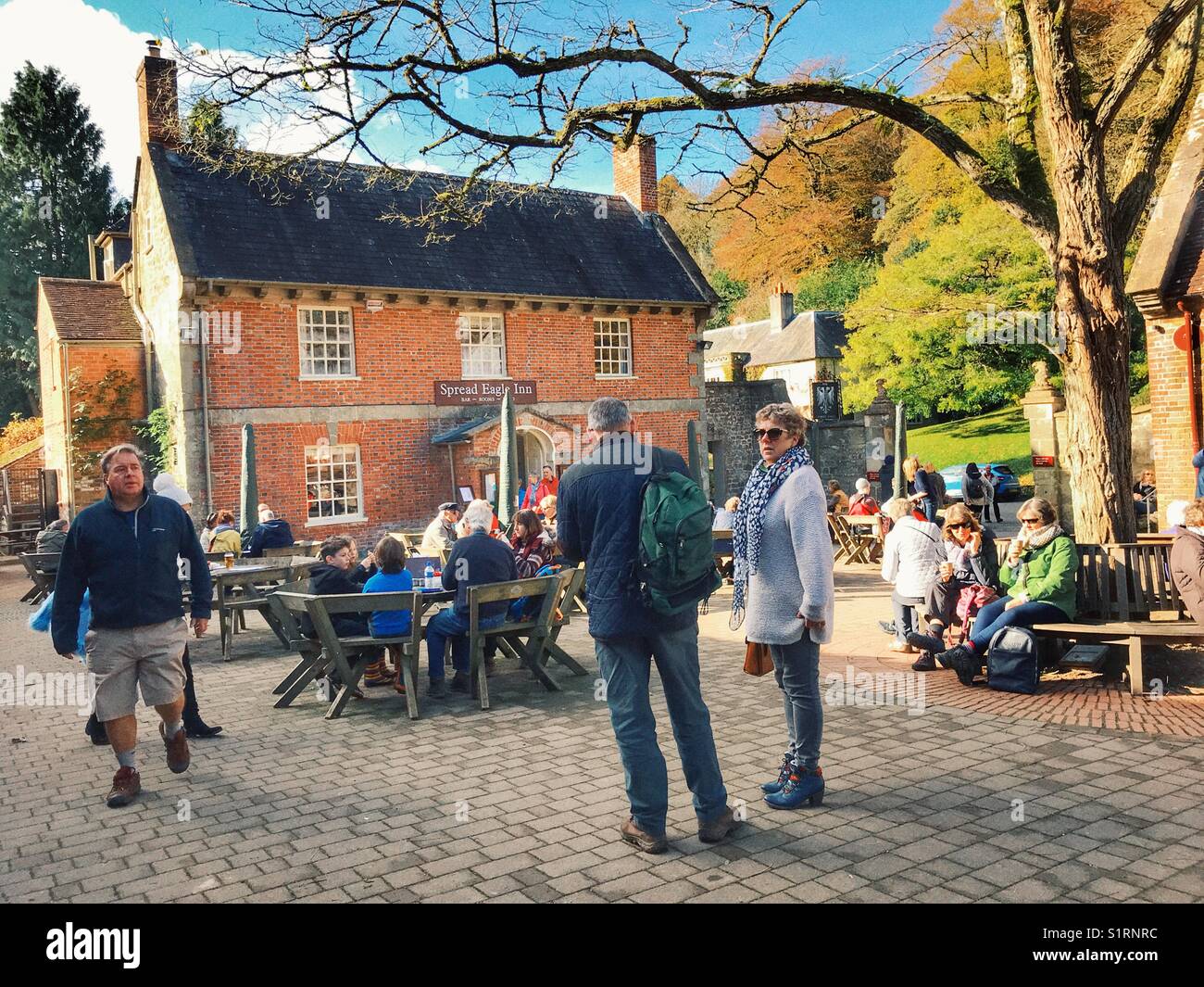 The courtyard of The Spread Eagle Inn on a busy autumn afternoon