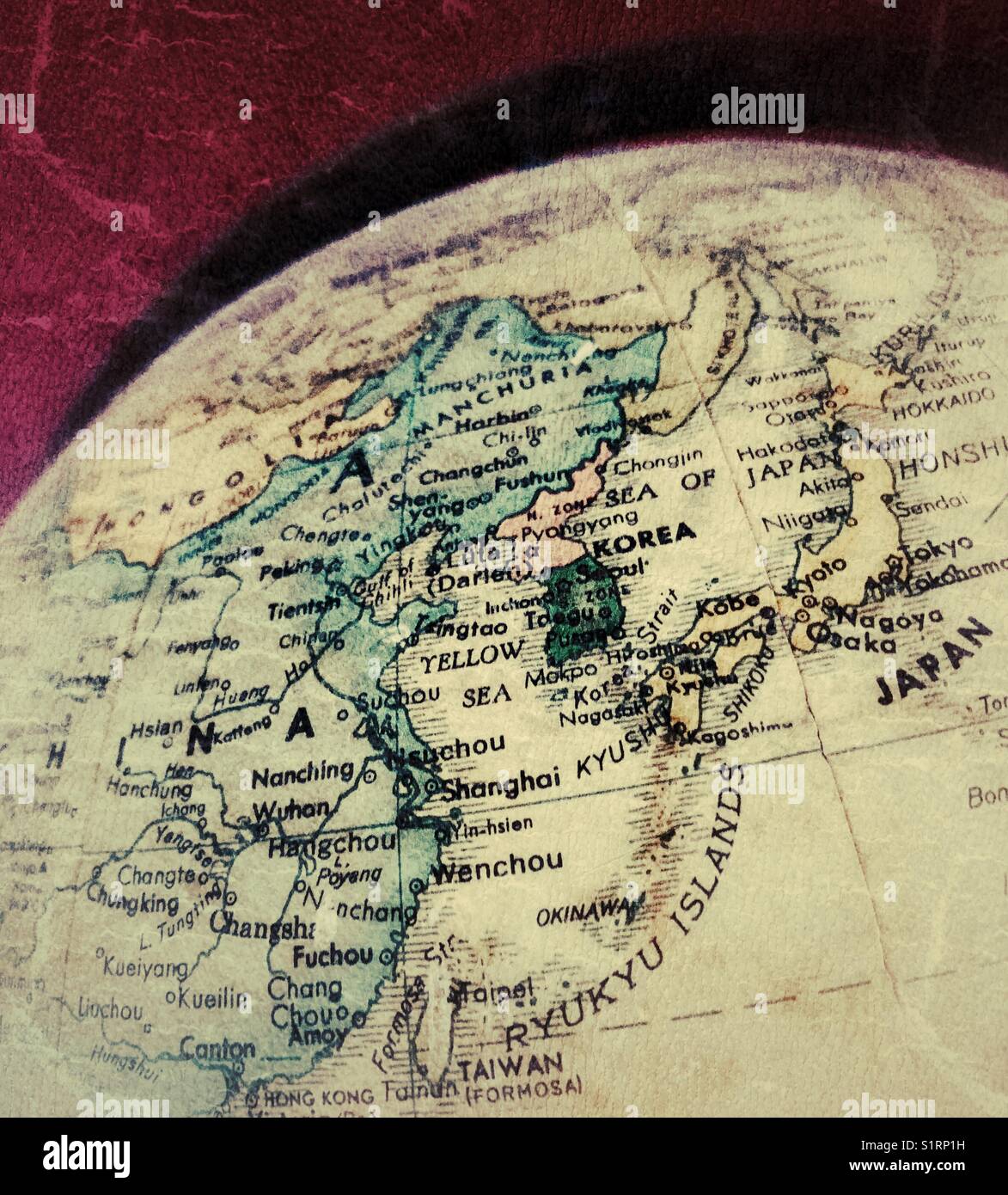 Closeup of antique world globe with focus on Korea, Japan, eastern China Stock Photo