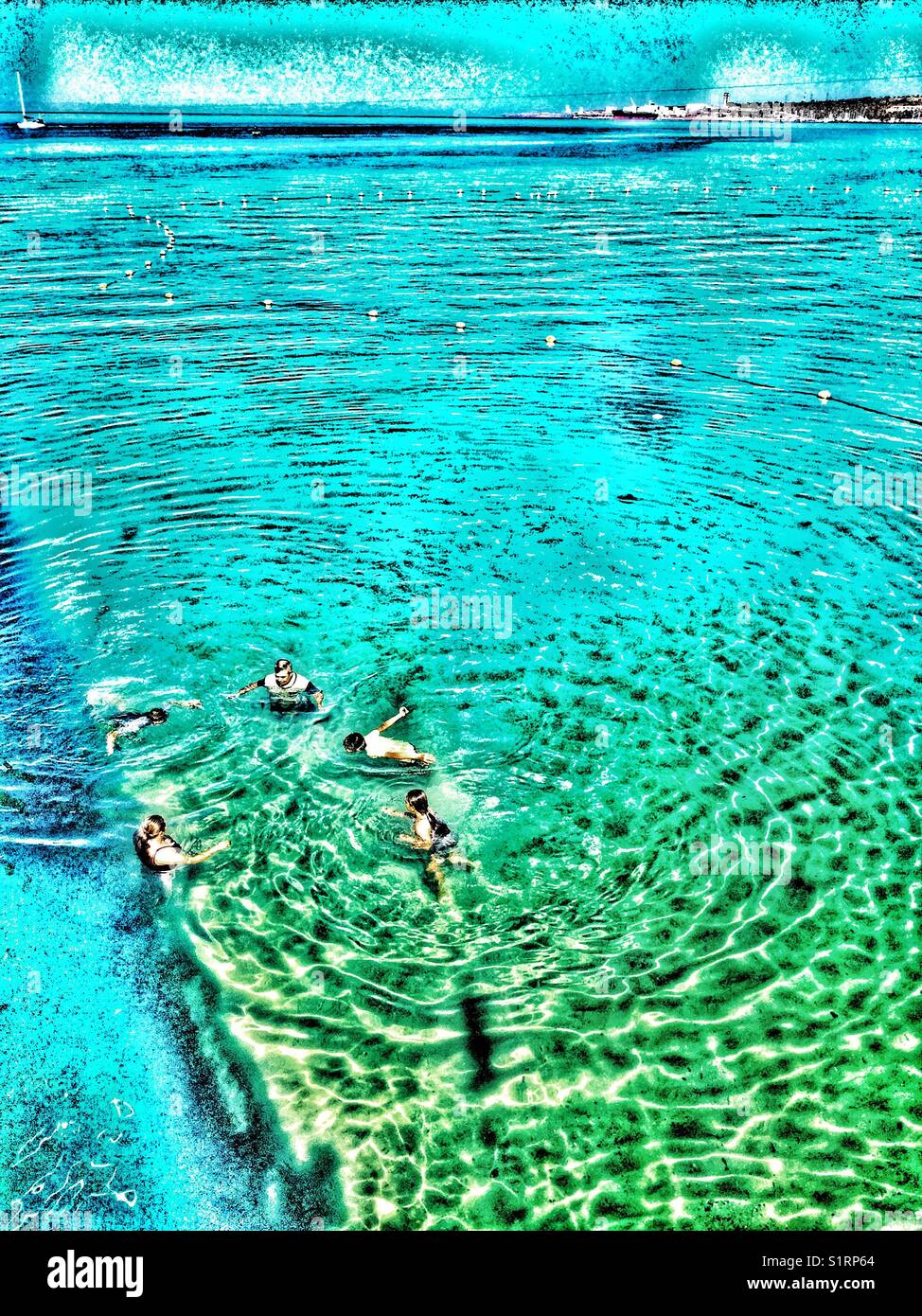 Artistic rendering of swimmers in the sea. - Smartphone Captured Stock Image
