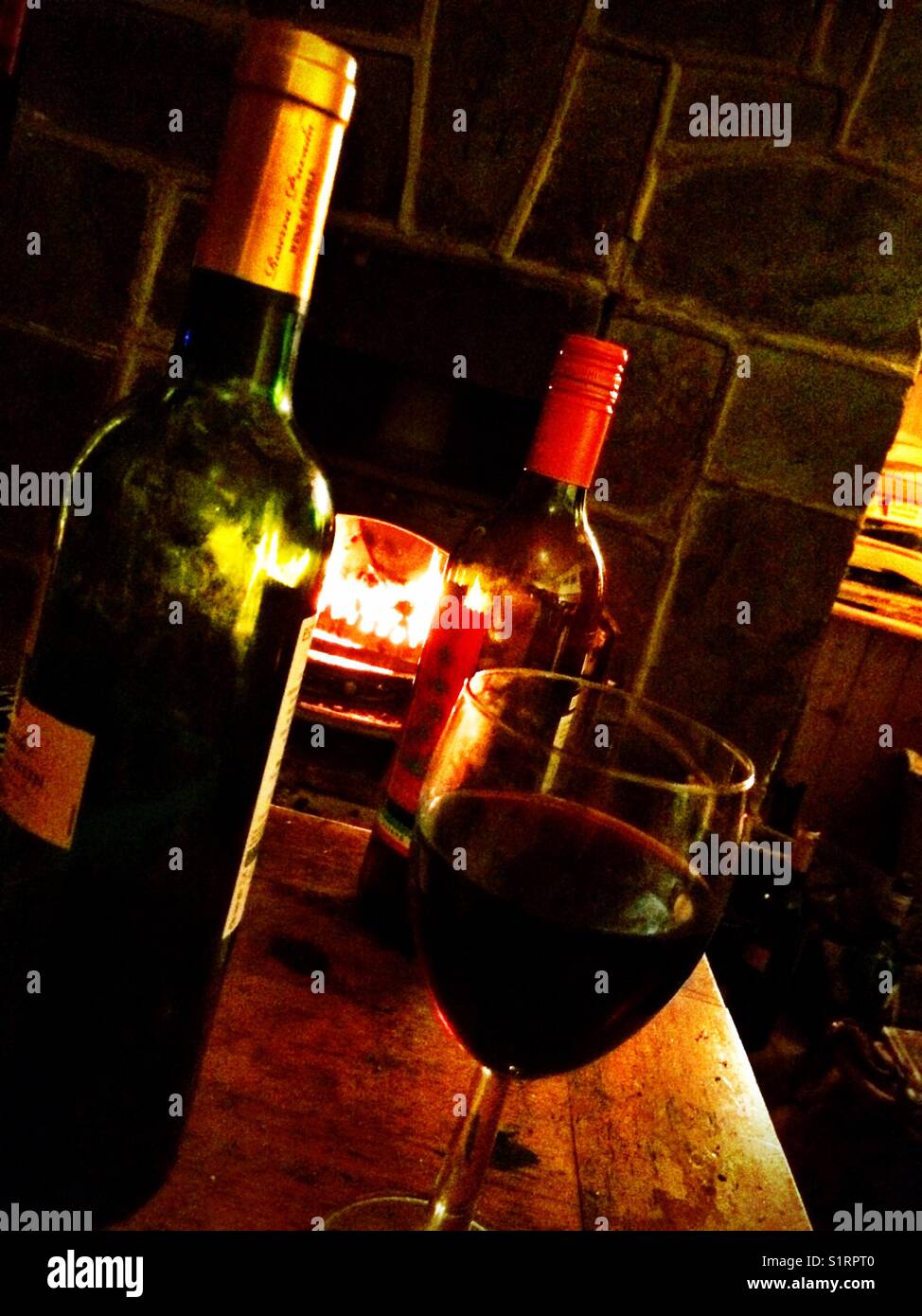 Wine by the fireside - Smartphone Captured Stock Image