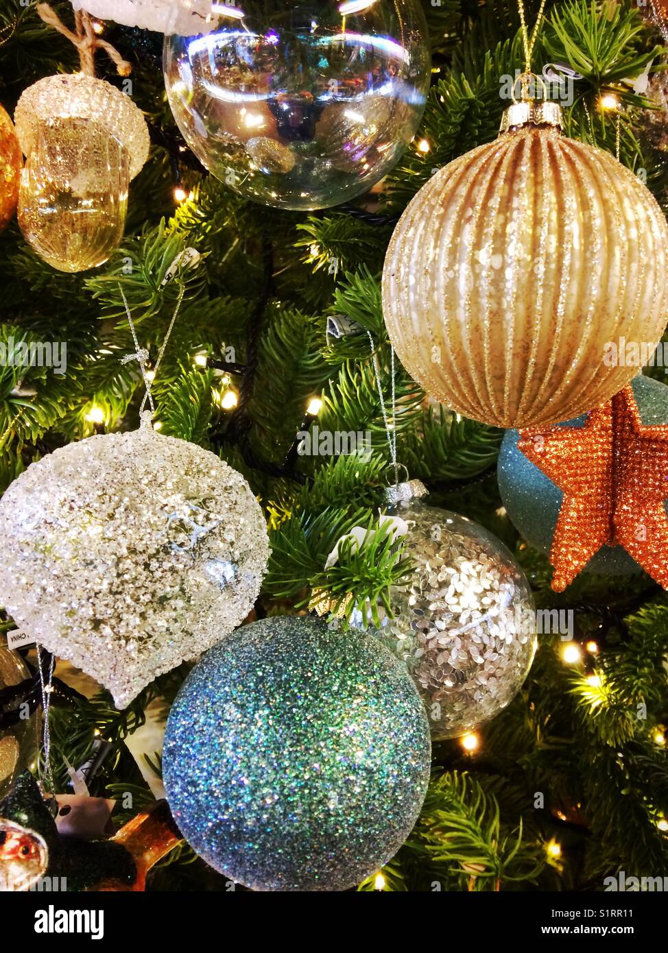 Christmas baubles hanging on a Christmas tree - Smartphone Captured Stock Image