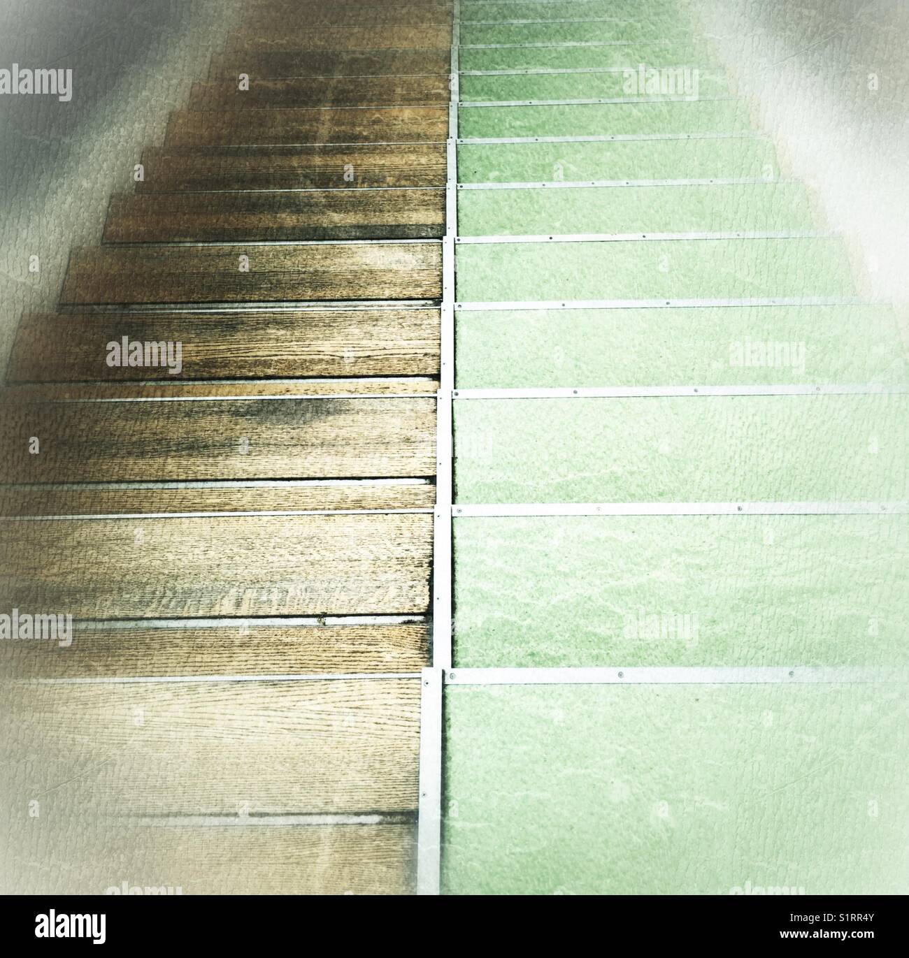 Down the stairs, split staircase, two- tone colors. - Smartphone Captured Stock Image