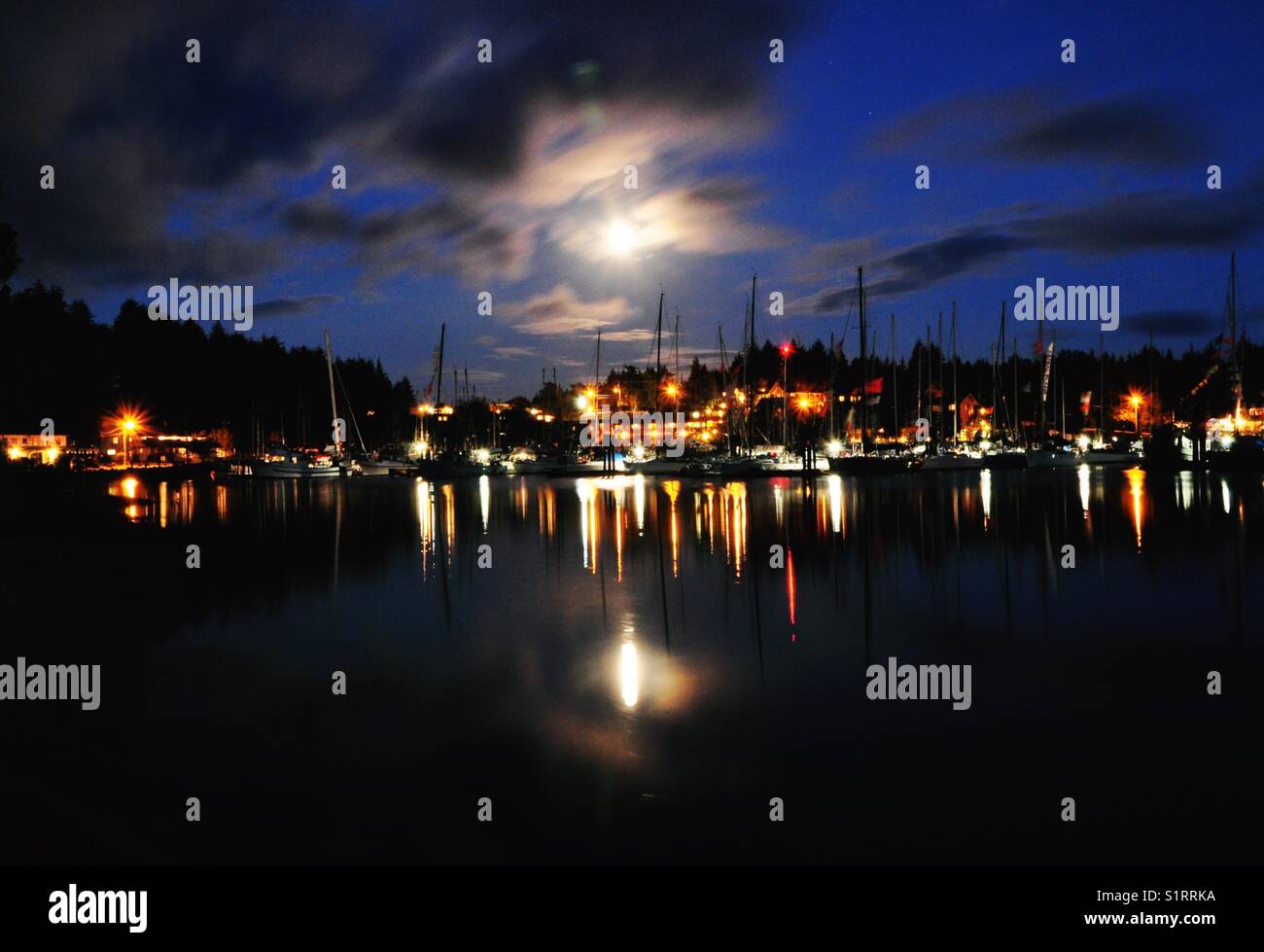 Moonlight harbour in Ucluelet on Vancouver Island, British Columbia, Canada Stock Photo