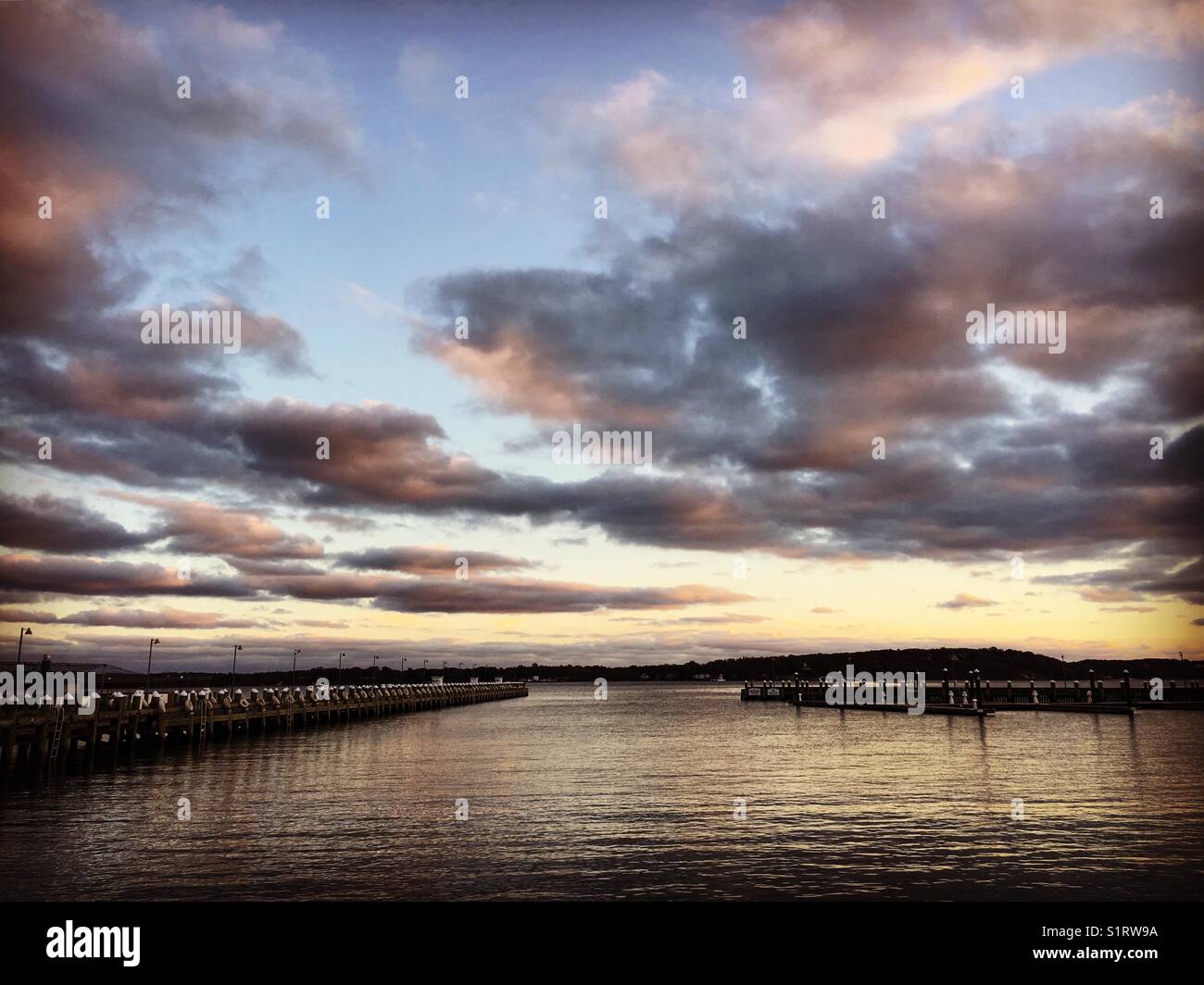 Greenport NY harbor at sunset Stock Photo Alamy