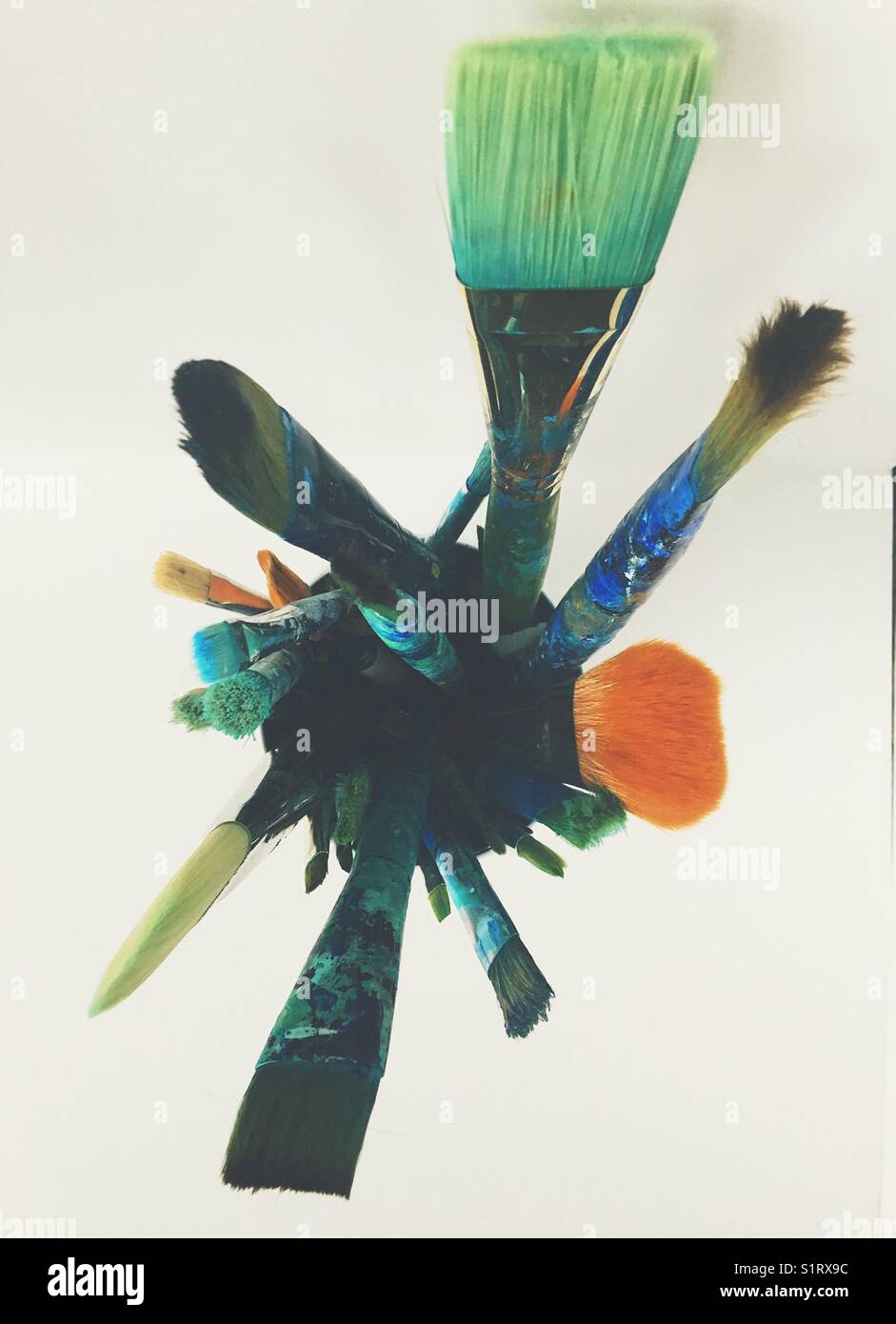 Paintbrushes in a container photographed from above. - Smartphone Captured Stock Image