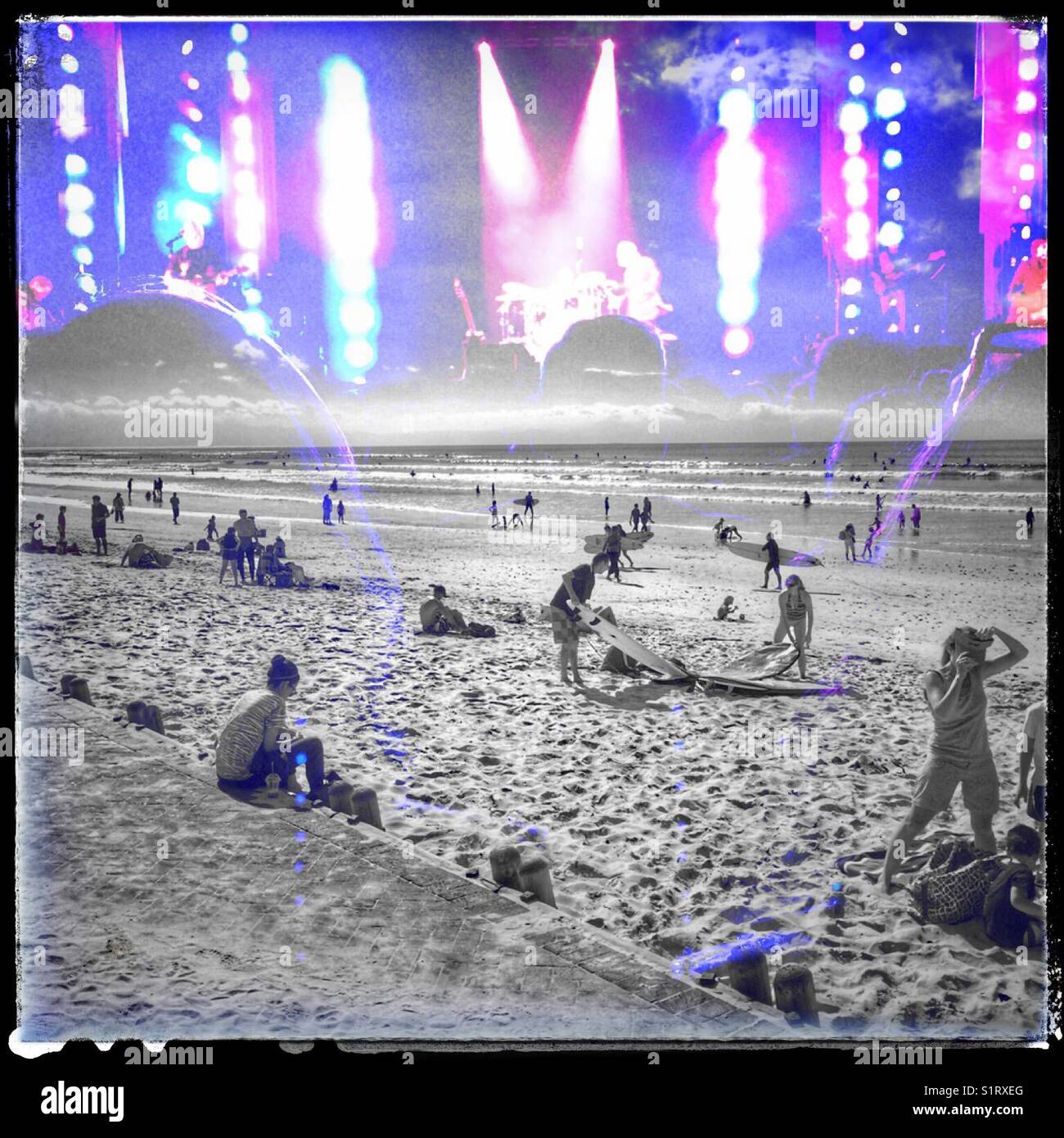 Double exposure of people at beach and live concert. - Smartphone Captured Stock Image